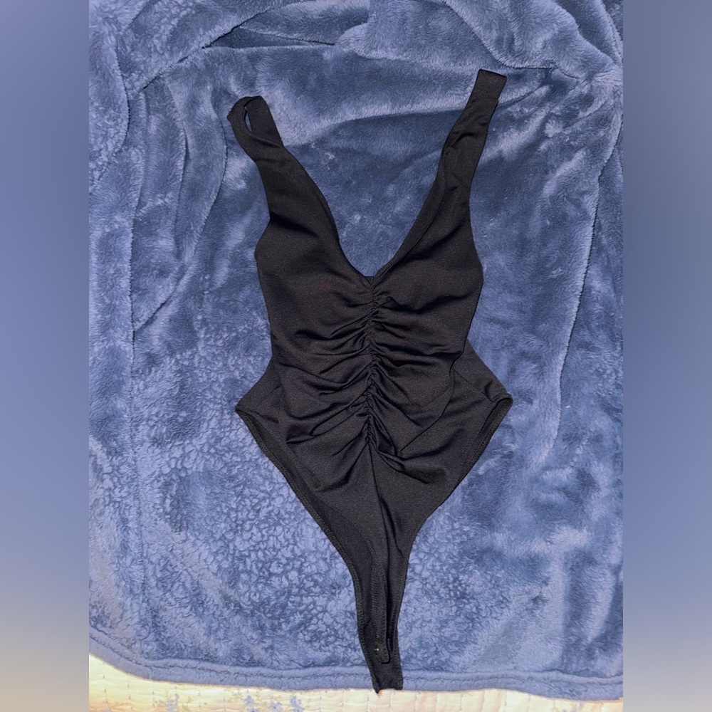 Black low cut body suit